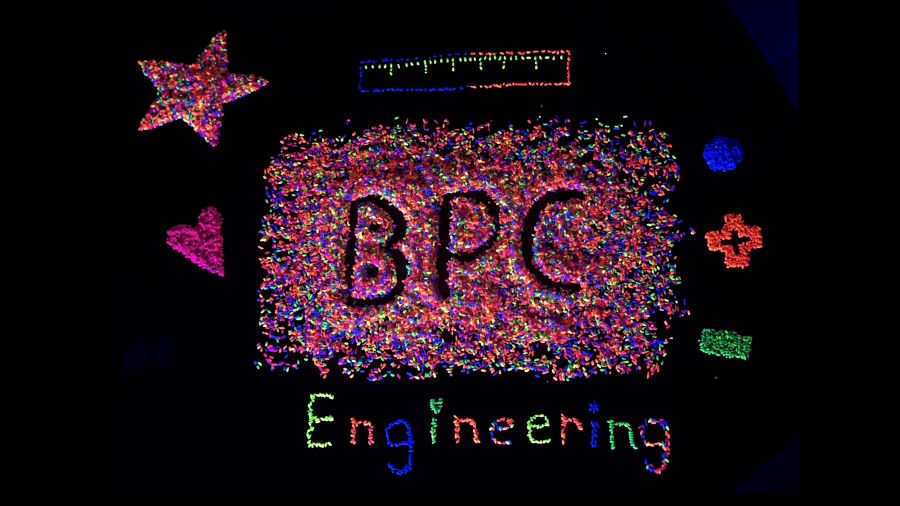 Glow in the dark beads spelling out "BPC Engineering"