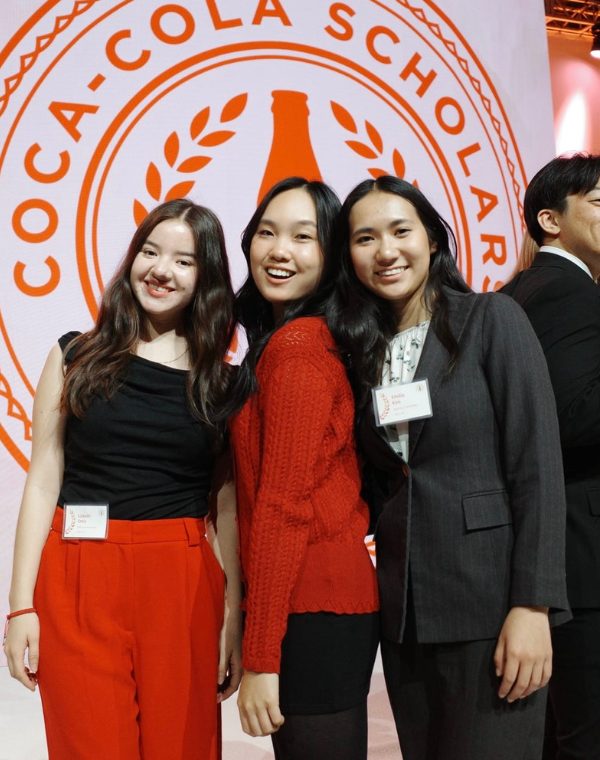 BASIS Oro Valley Coca-Cola Scholar Emilia K. posing at the Coca-Cola Scholar weekend with two other winners
