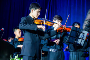 basis-gala-orchestra-violinists-scaled.jpg