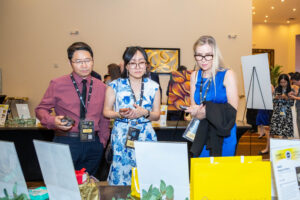basis-gala-people-checking-silent-auction-scaled.jpg