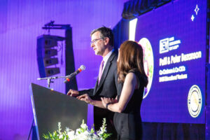 basis-gala-peter-and-patti-bezanson-speaking-scaled.jpg