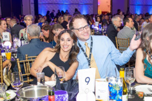 basis-gala-two-eventees-at-table-scaled.jpg
