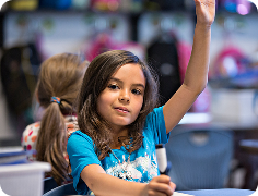 kid-raising-hand-in-class_menu-enrollment-guide.png